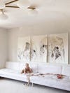 baby drawing on white sofa