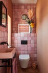 pink tiled powder room