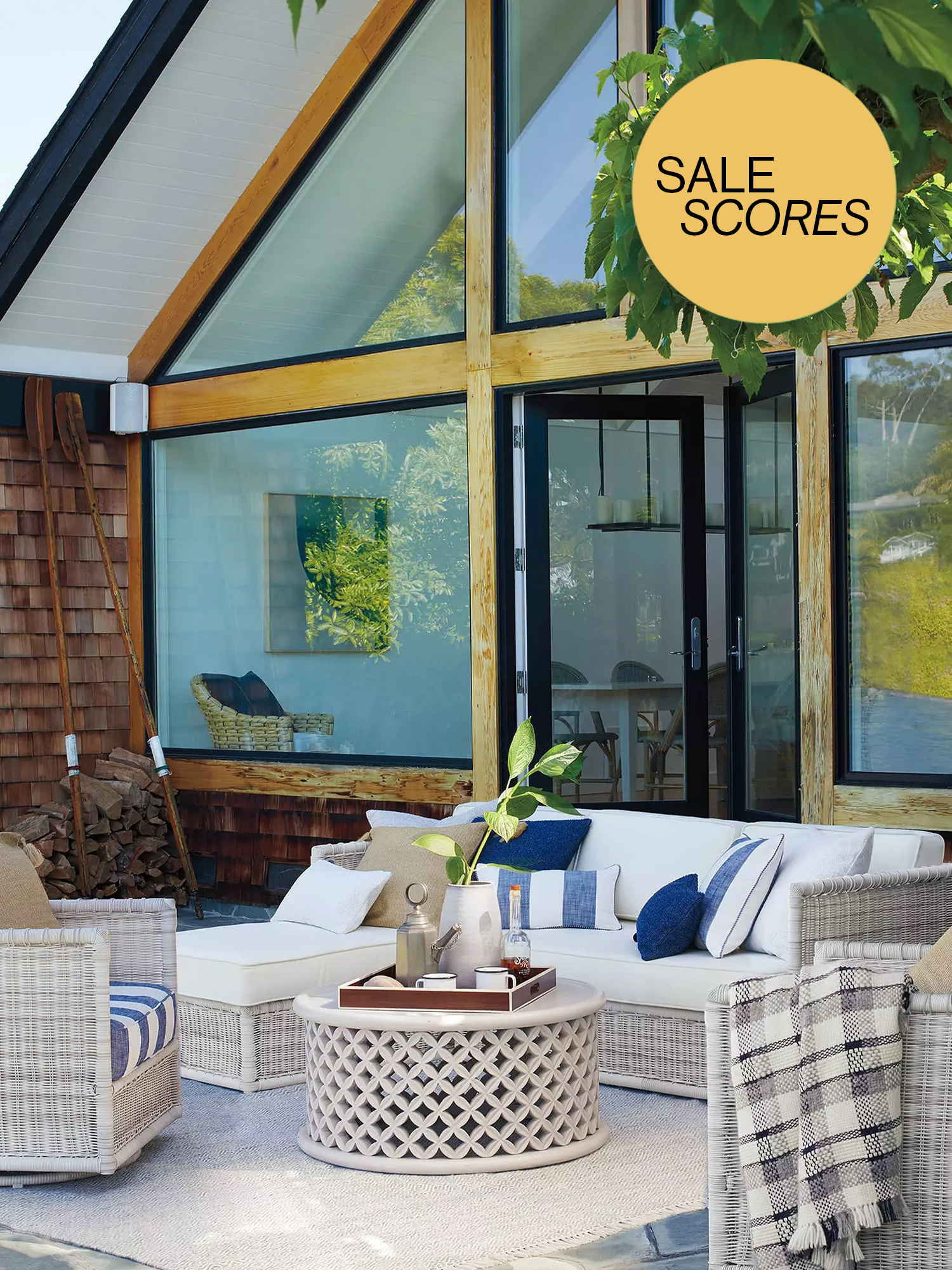 outdoor shot of home with serena & lilycoffee table and yellow sale scores button