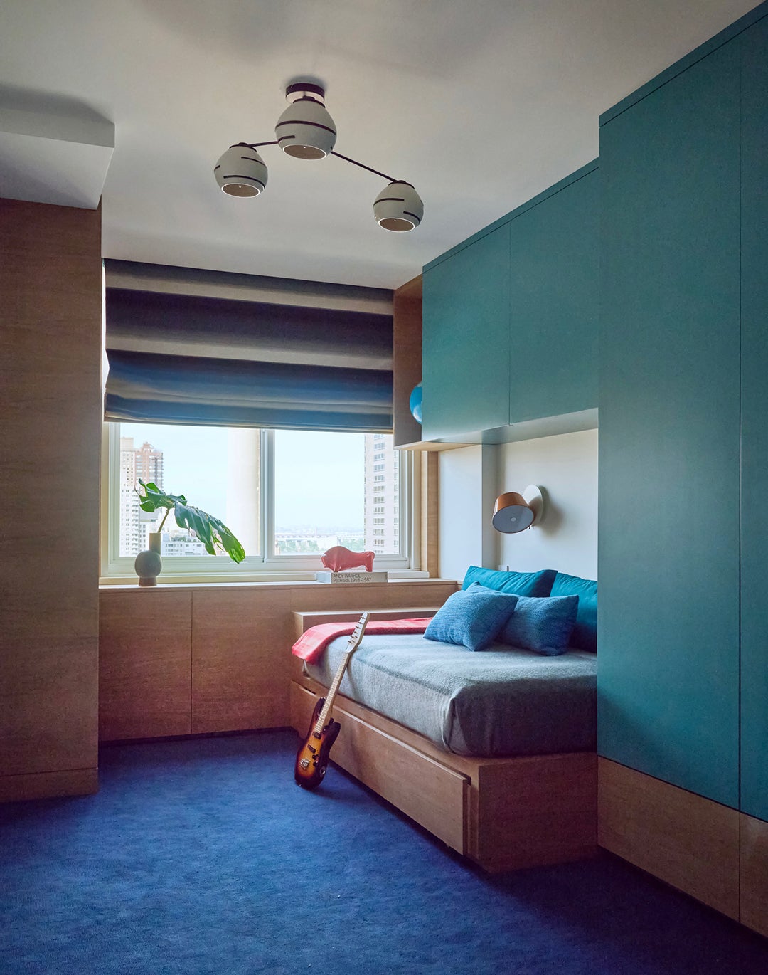bedroom with teal walls