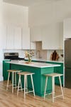 modern kitchen with kelly green island