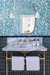 blue tile and wallpaper bathroom