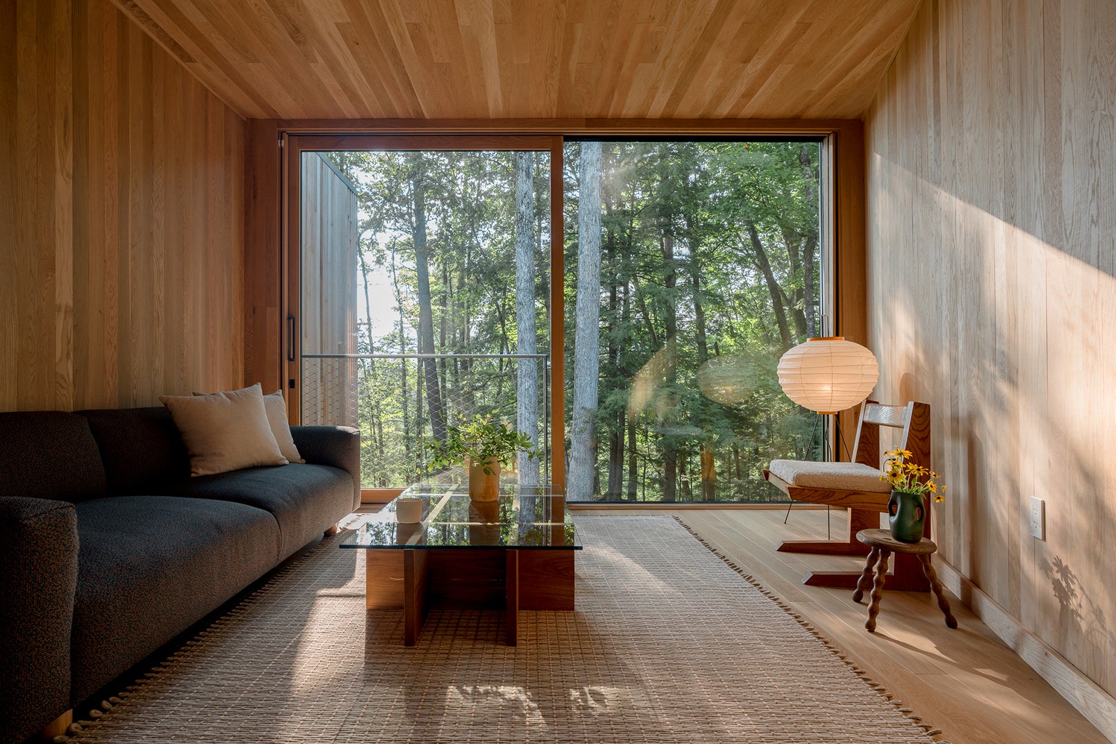 Wood-paneled room with sofa