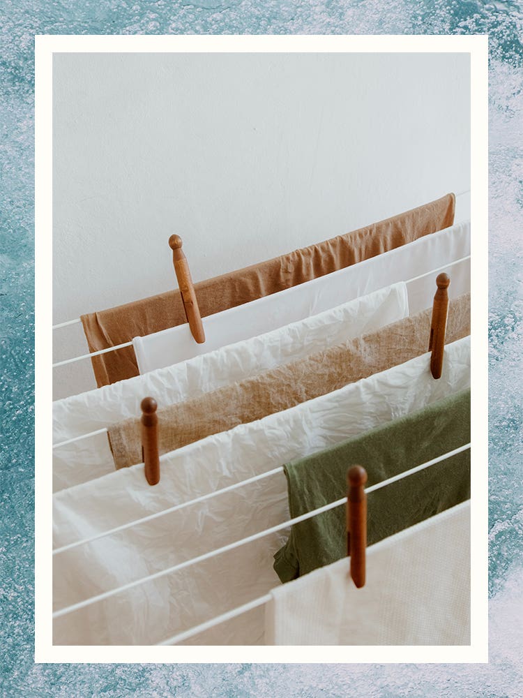 laundry hanging by clothespins on a clothesline