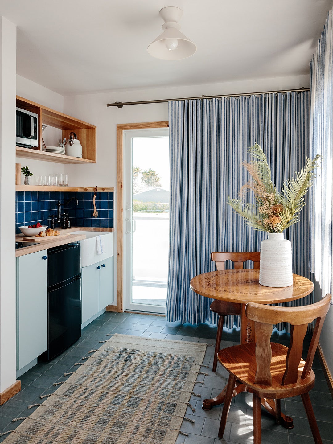 Motel kitchen with blue tile
