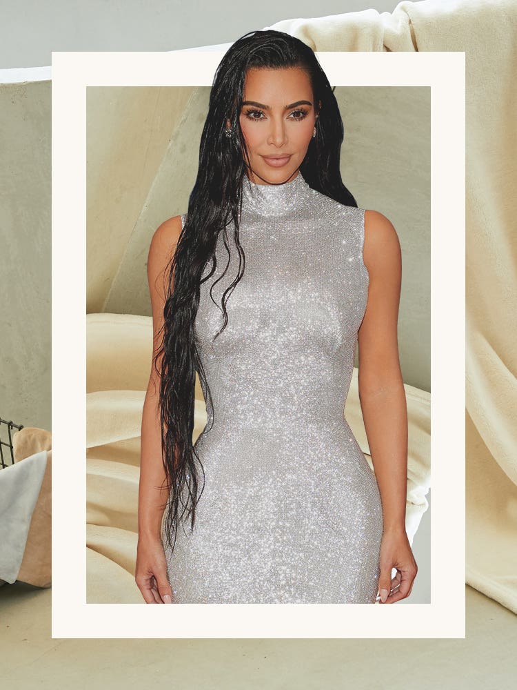 Kim Kardashian wearing a silver dress