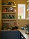 yellow pantry with open shelving