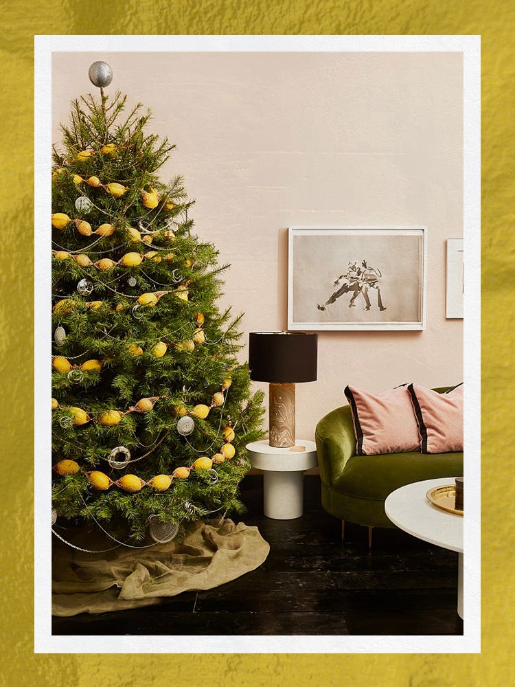 christmas tree with lemon garland and green tree skirt