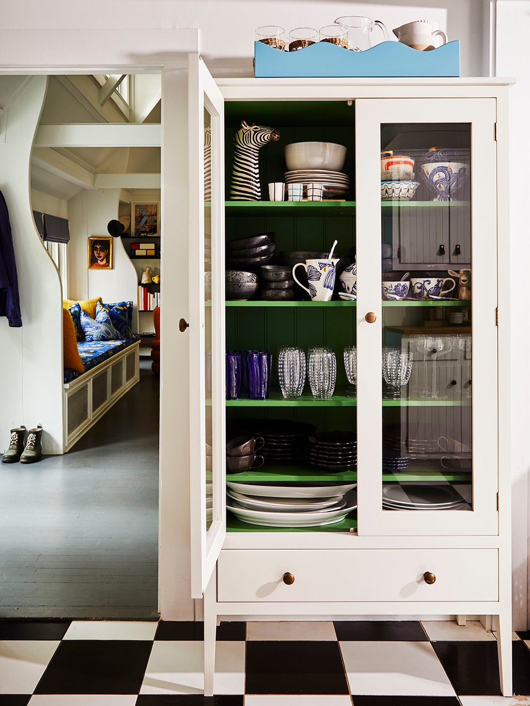 white storage cabinet with bright green interior