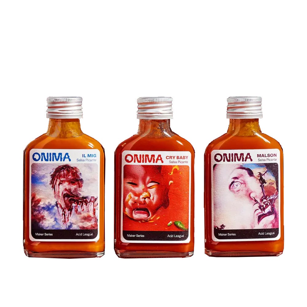 Acid League OMINA Trio hot sauces in a row against a white background.
