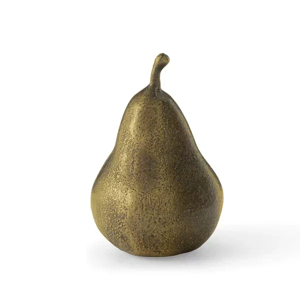 Pear paperweight against a white background.