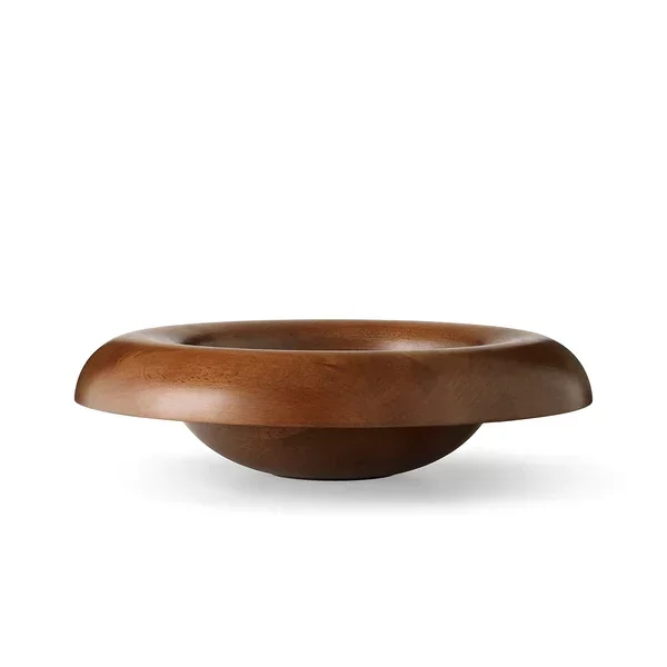 Wooden bowl against a white background.