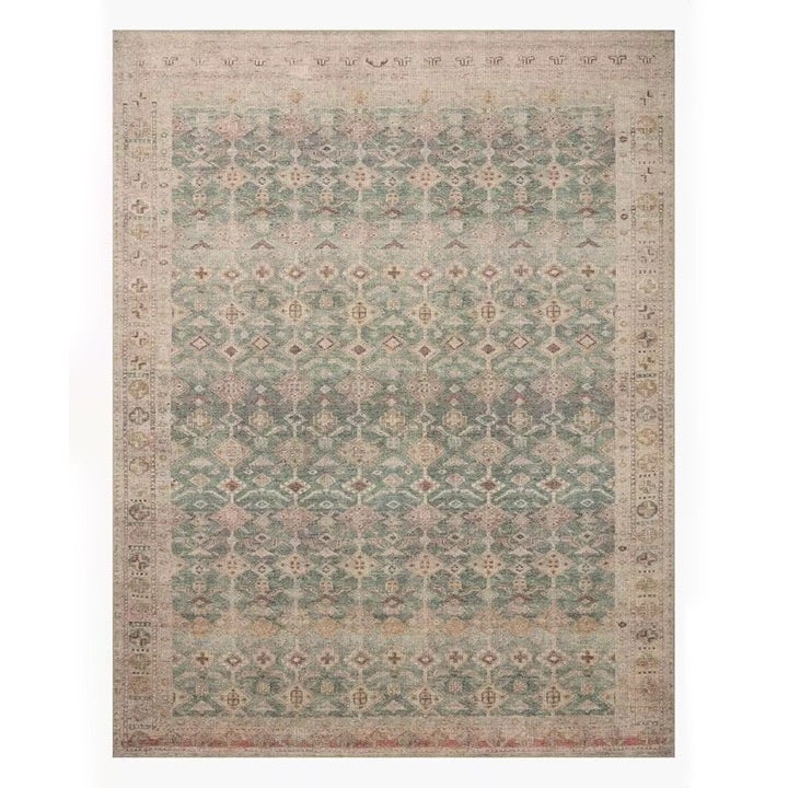 peach and blue distressed antique printed rug
