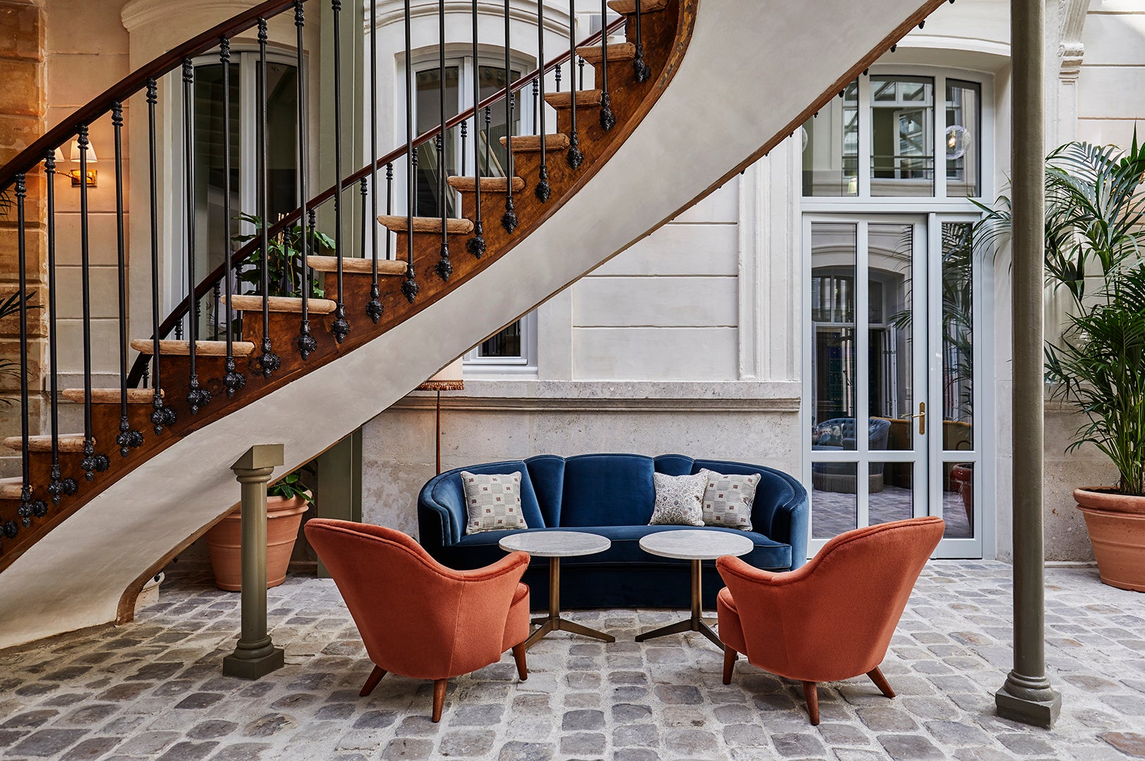 velvet seats in the lobby of the hotel hoxton paris 