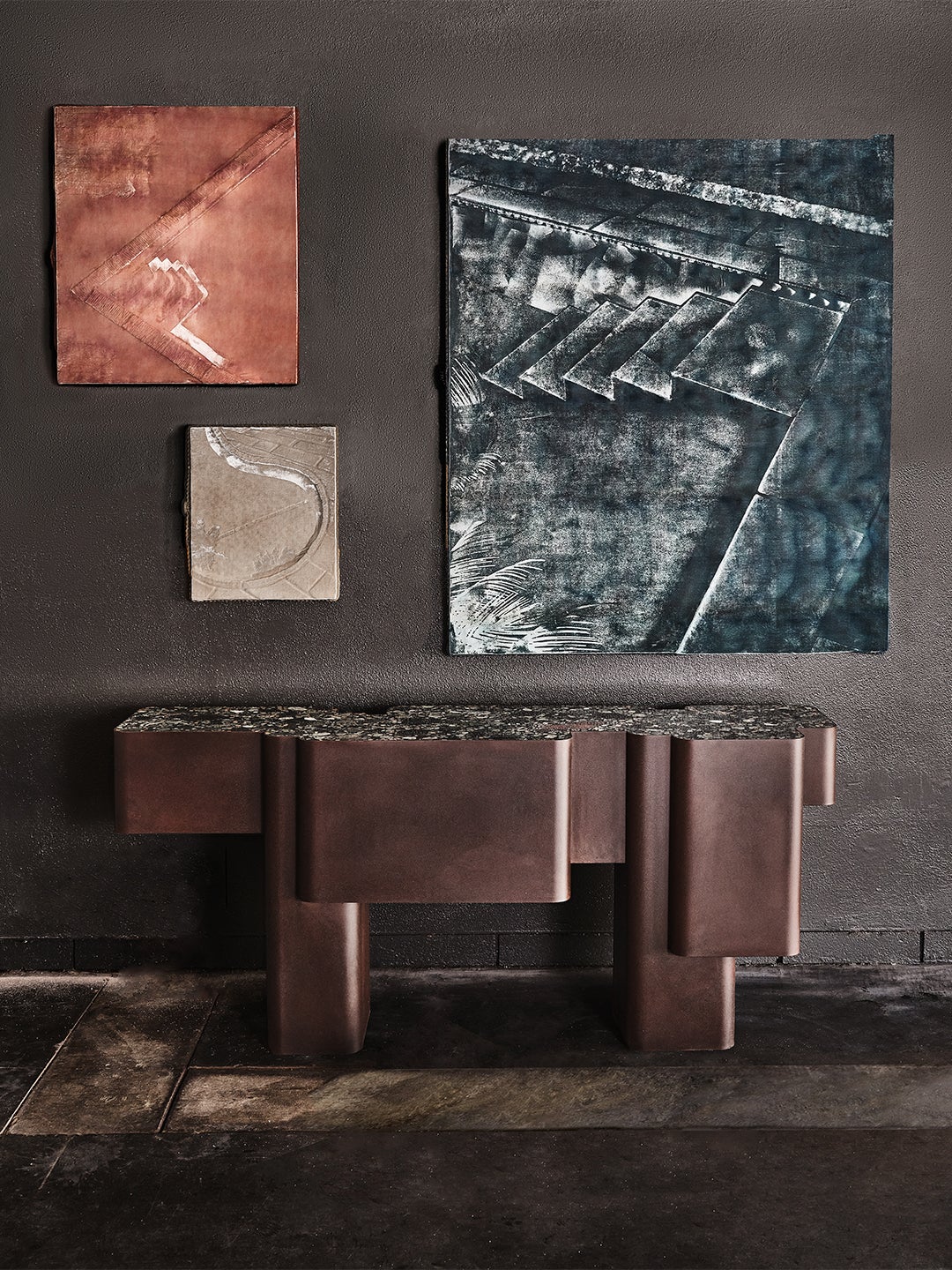 Collection of velvet art and a terrazzo table