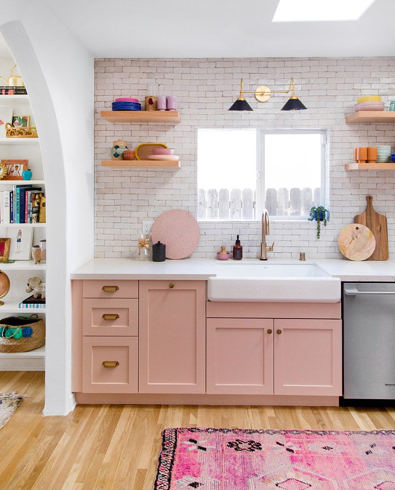 pink kitchen with white walls