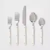 Cream stainless steel silverware set against a white background.
