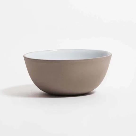 Grey stoneware bowl against a white background.
