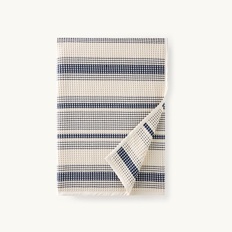 navy and white striped waffle blanket