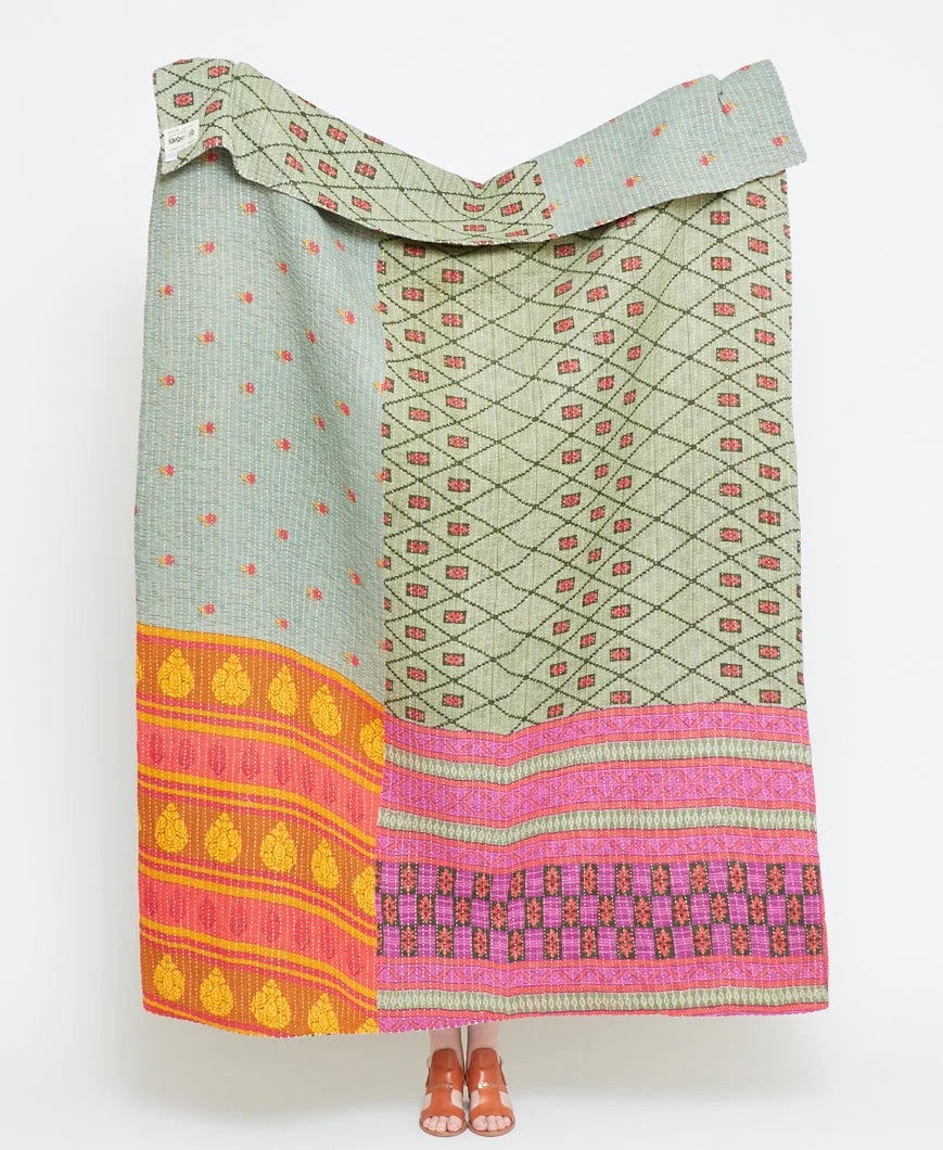 pastel blue and pink kantha quilt