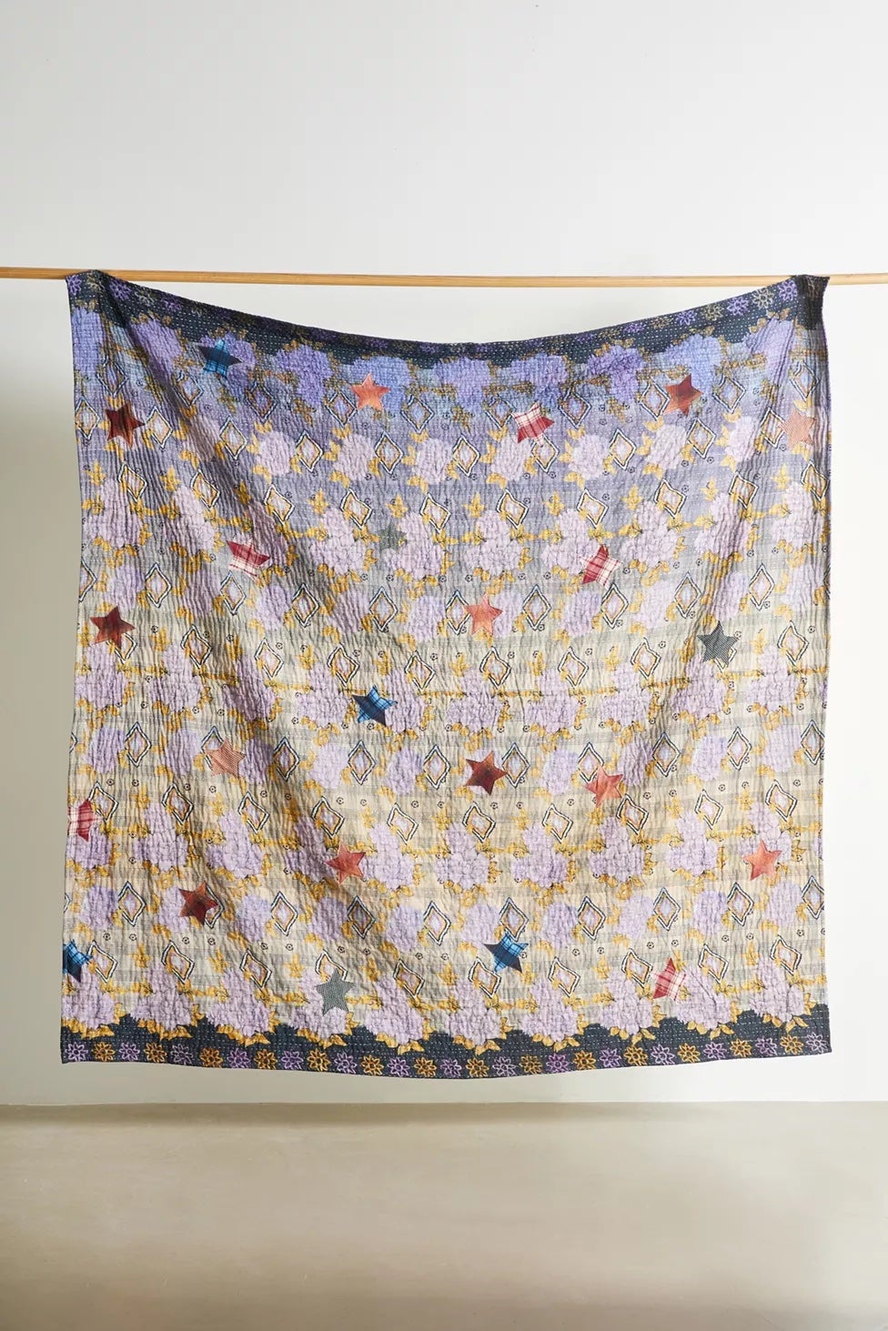 kantha quilt with star embroidery