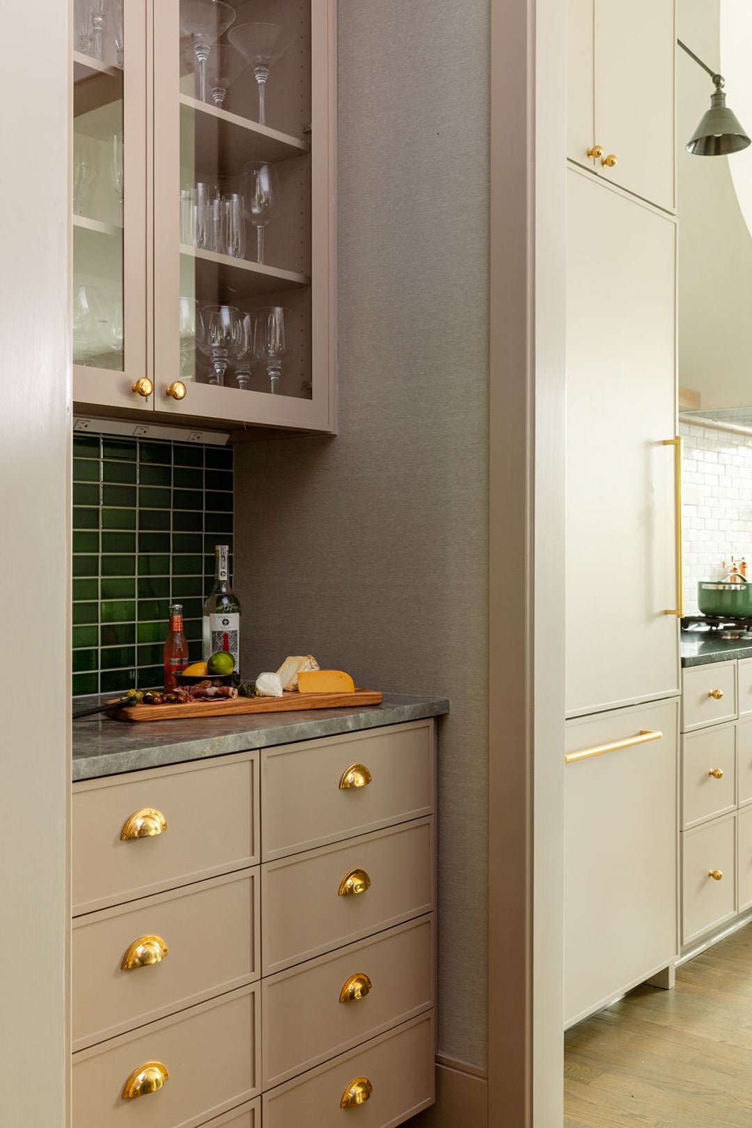 walk-in kitchen nook with green tiles