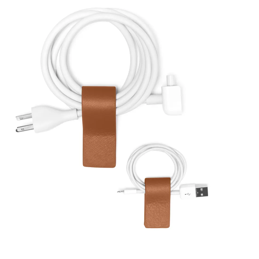 Two brown leather cord straps holding looped white cords against a white background.