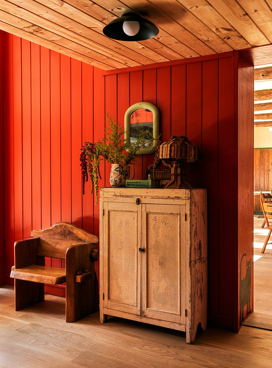 wood chest in red room
