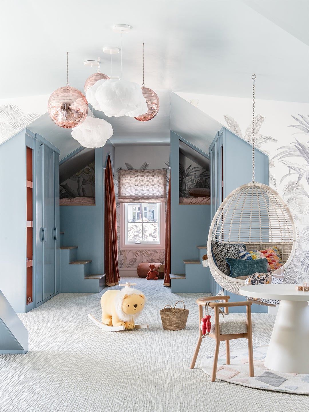 pale blue built-in bunk beds with stairs
