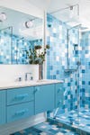 Bathroom with mixed blue tiles