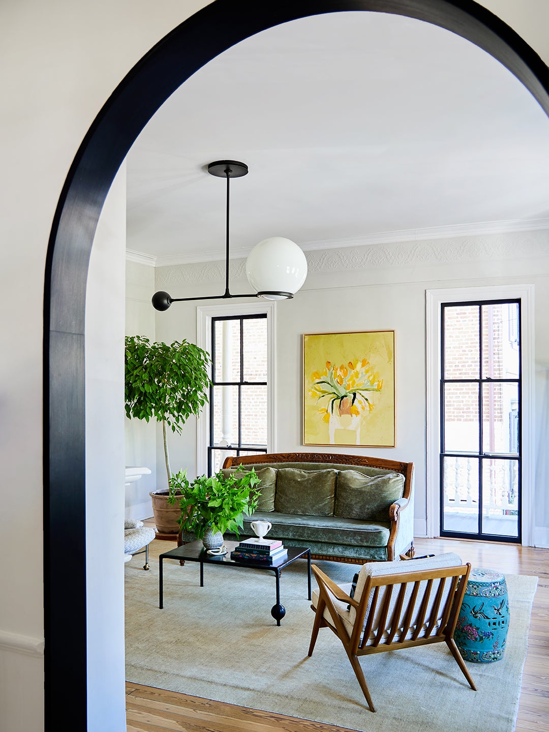 black-trimmed archway into living room