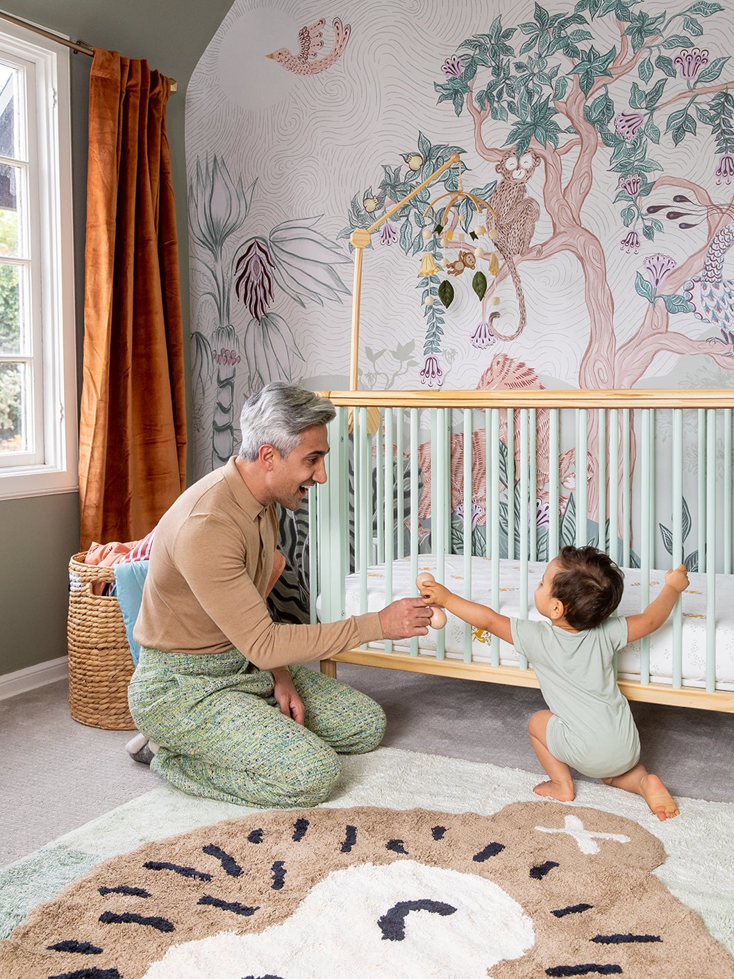 Tan France Designed a Pastel Crib to Go Front and Center in His Son's Tropical Nursery