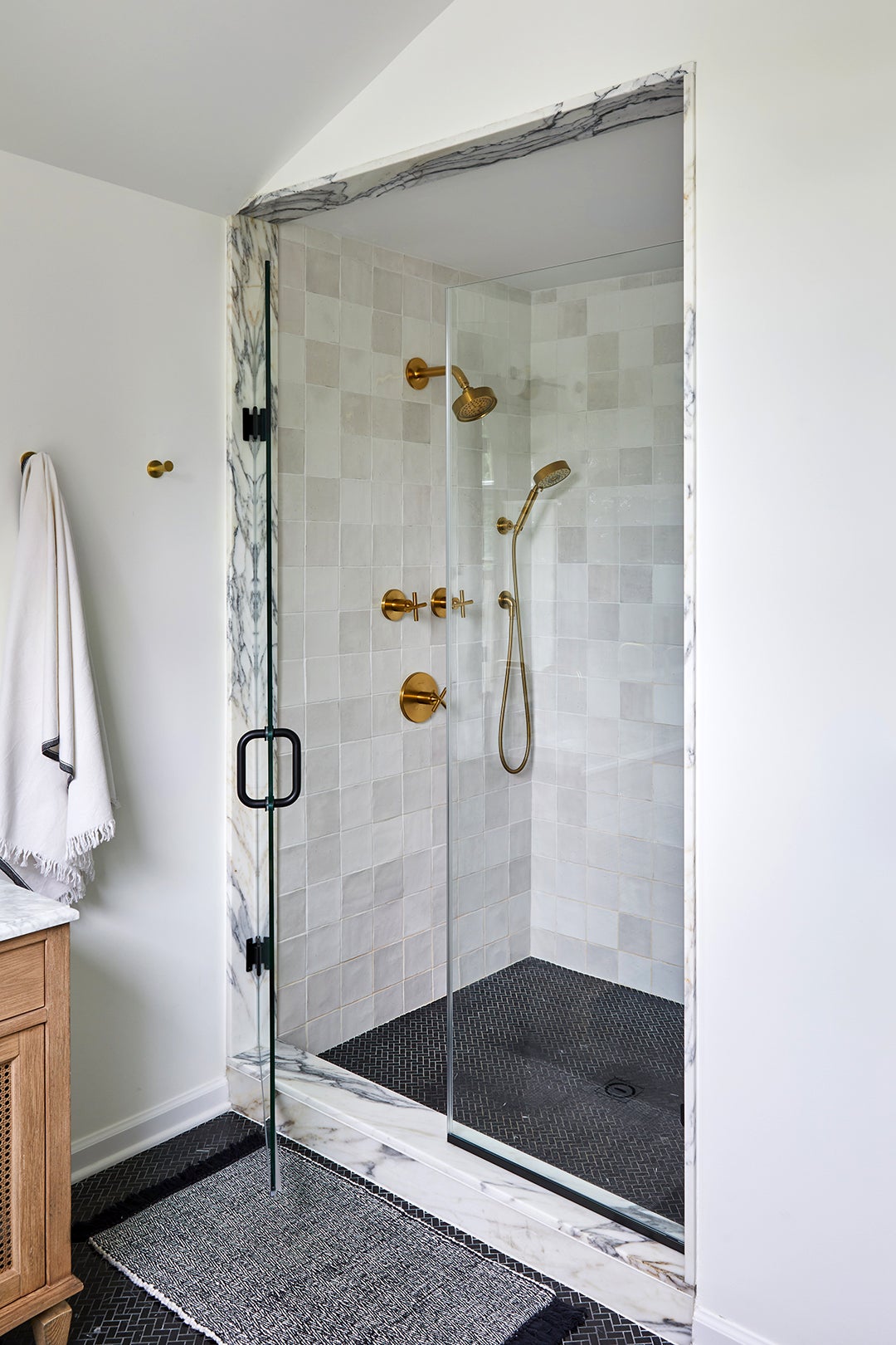 marble-trimmed shower stall