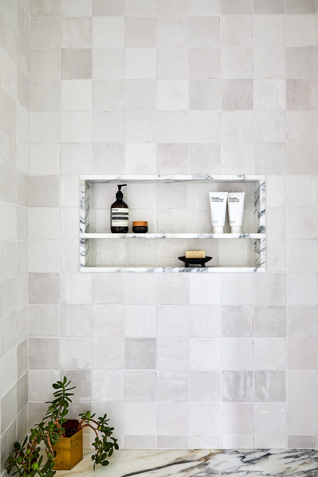 tonal white and gray tiled shower