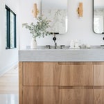 wood vanity with concrete sink