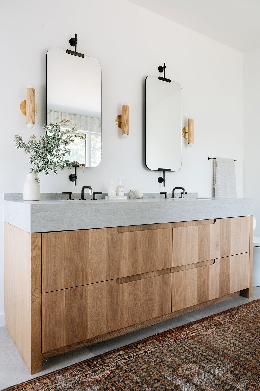 wood vanity with concrete sink