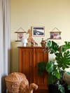 wood armoire in kid's yellow room