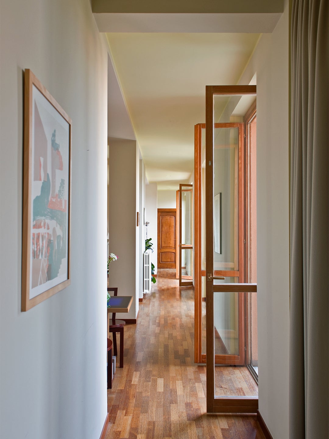 hallways with doors opening to terrace