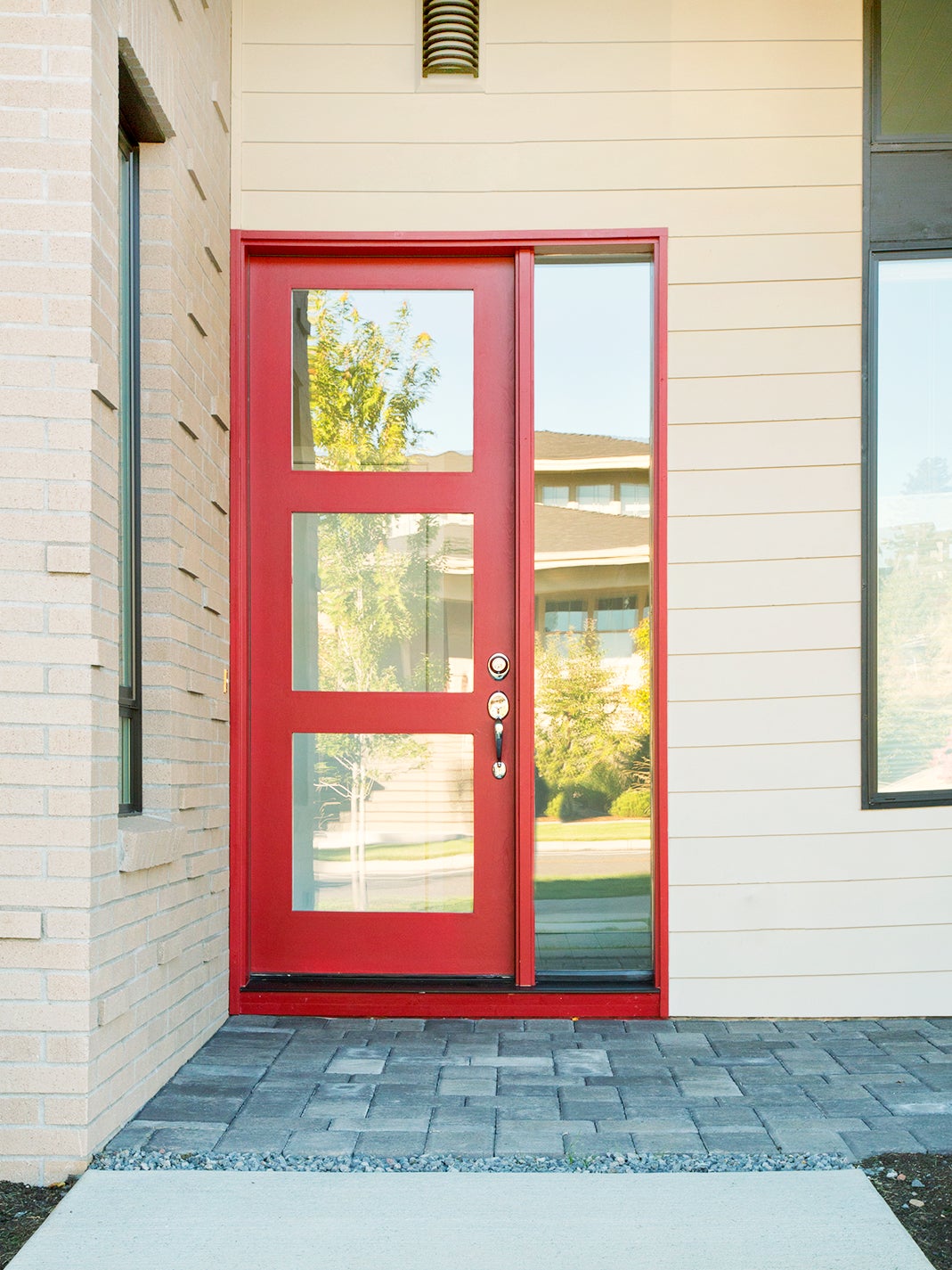 off-white exterior paint with red door