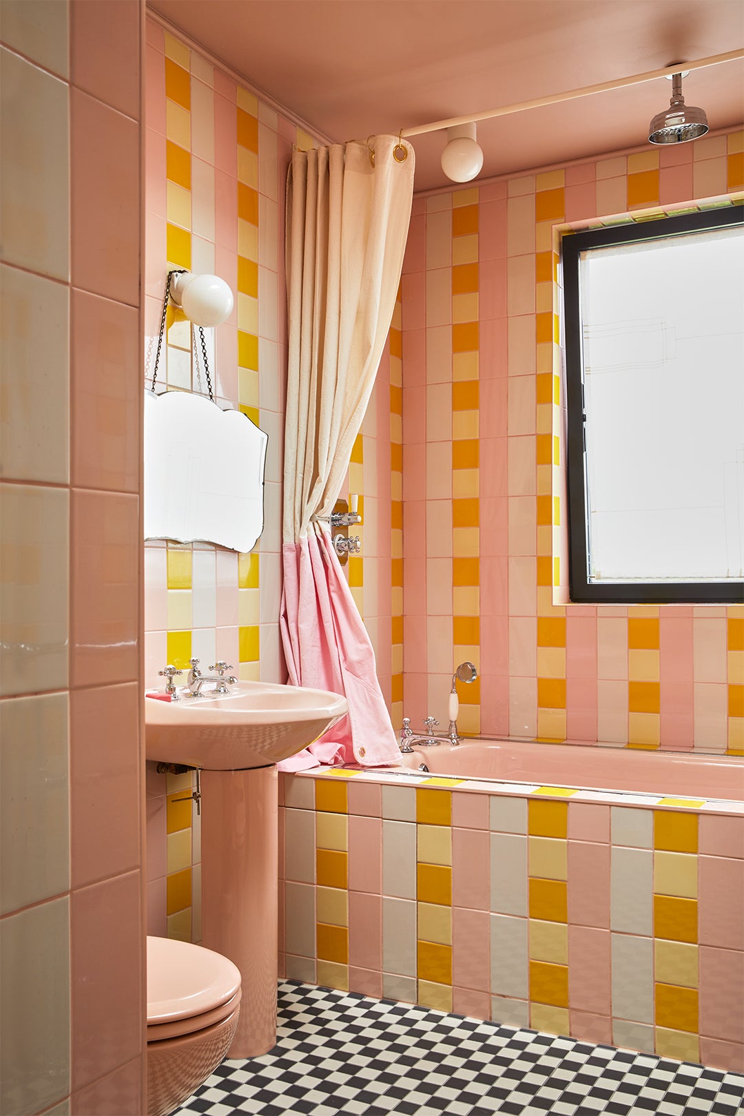 pink and yellow checkered bathroom