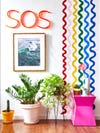 Living room with painted rainbow squiggles