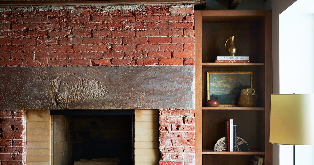 A Designer’s Tips for Decorating Around a Room with Exposed Brick