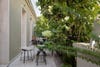lush green terrace with dining area