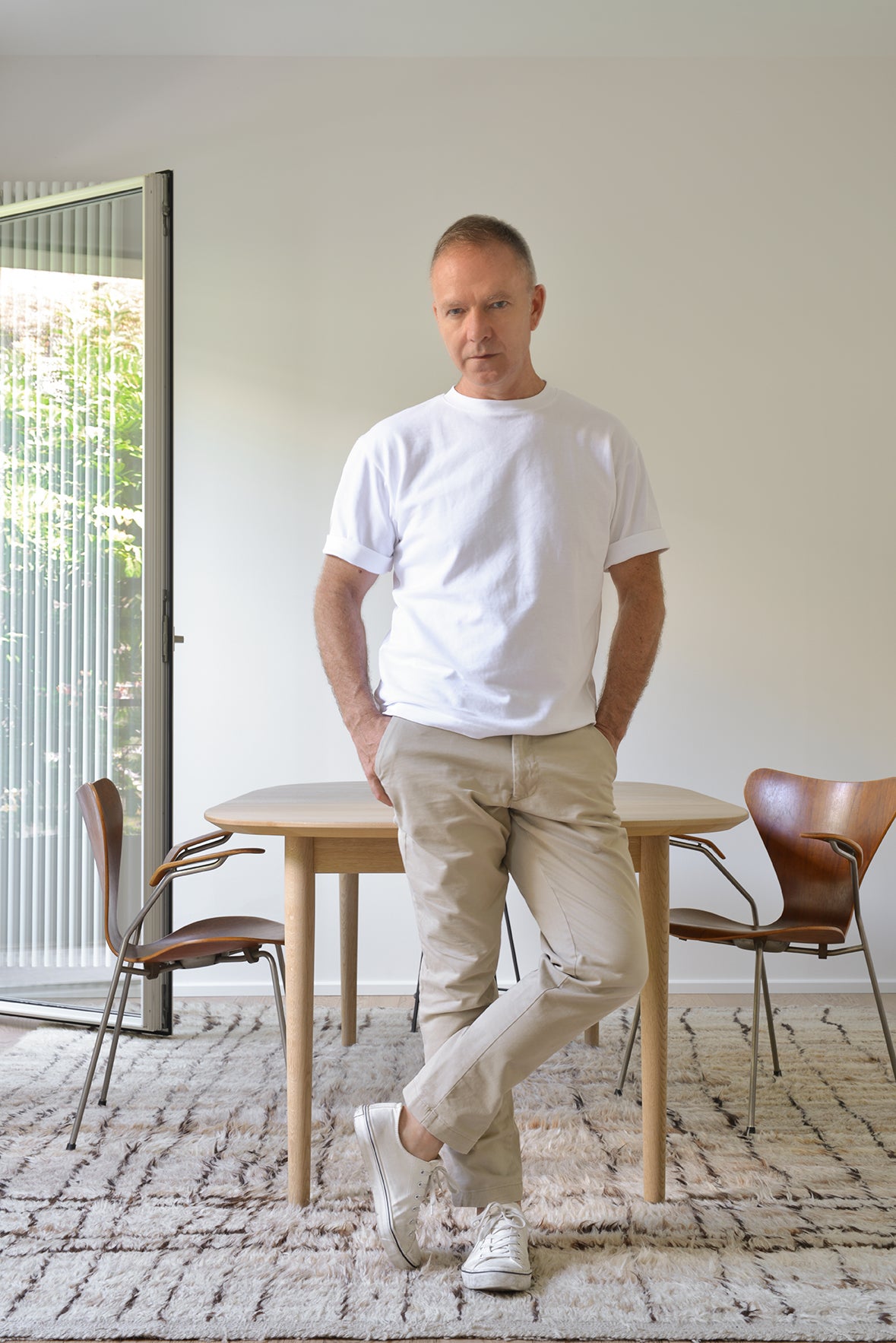 Marco Bertolini in front of dining table