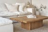 White couch around wooden coffee table