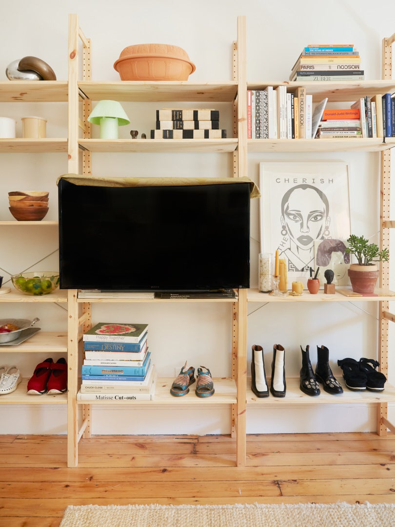 tv on wood shelves