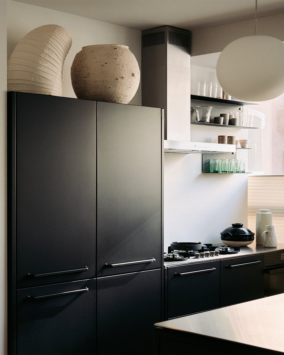 black paneled fridge