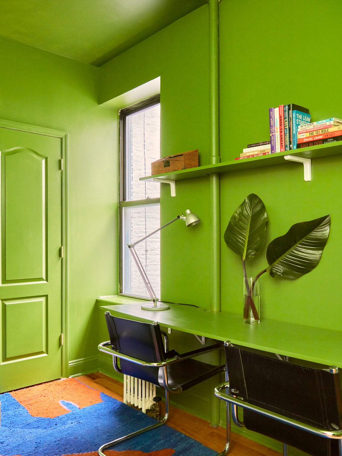 green desk and wall