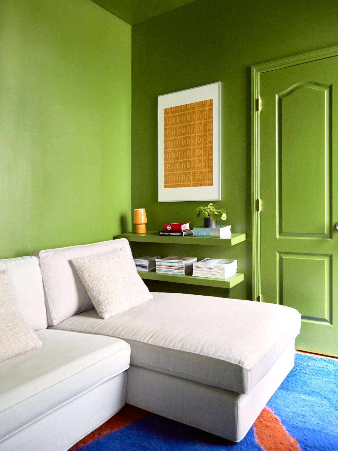 white sofa in green room