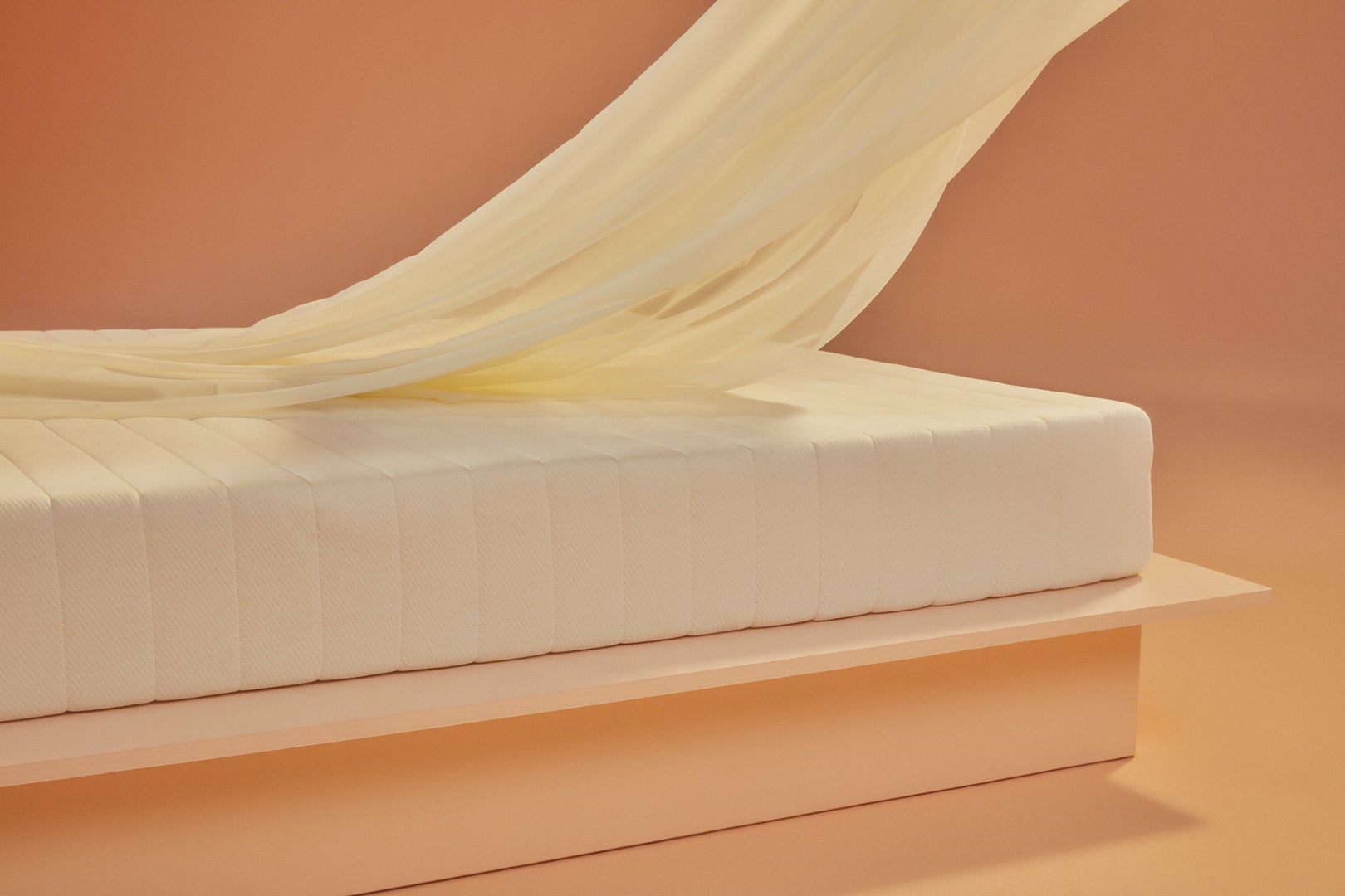 side view of bare mattress
